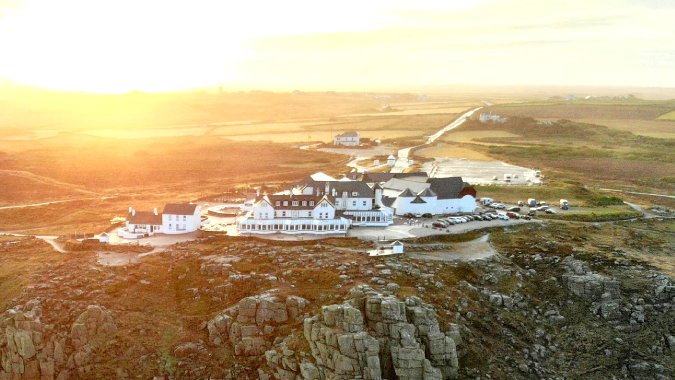 Land's End, Cornwall, England - image by Benjamin Elliott on Unsplash https://unsplash.com/photos/white-boat-on-sea-near-brown-rock-formation-during-daytime-lH0_kBu5iyo