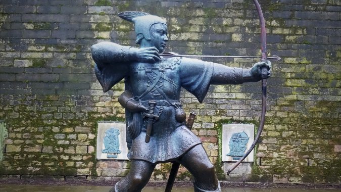 Robin Hood statue in Nottingham, England - image by Pixabay https://pixabay.com/photos/robin-hood-bow-and-arrow-3315061/
