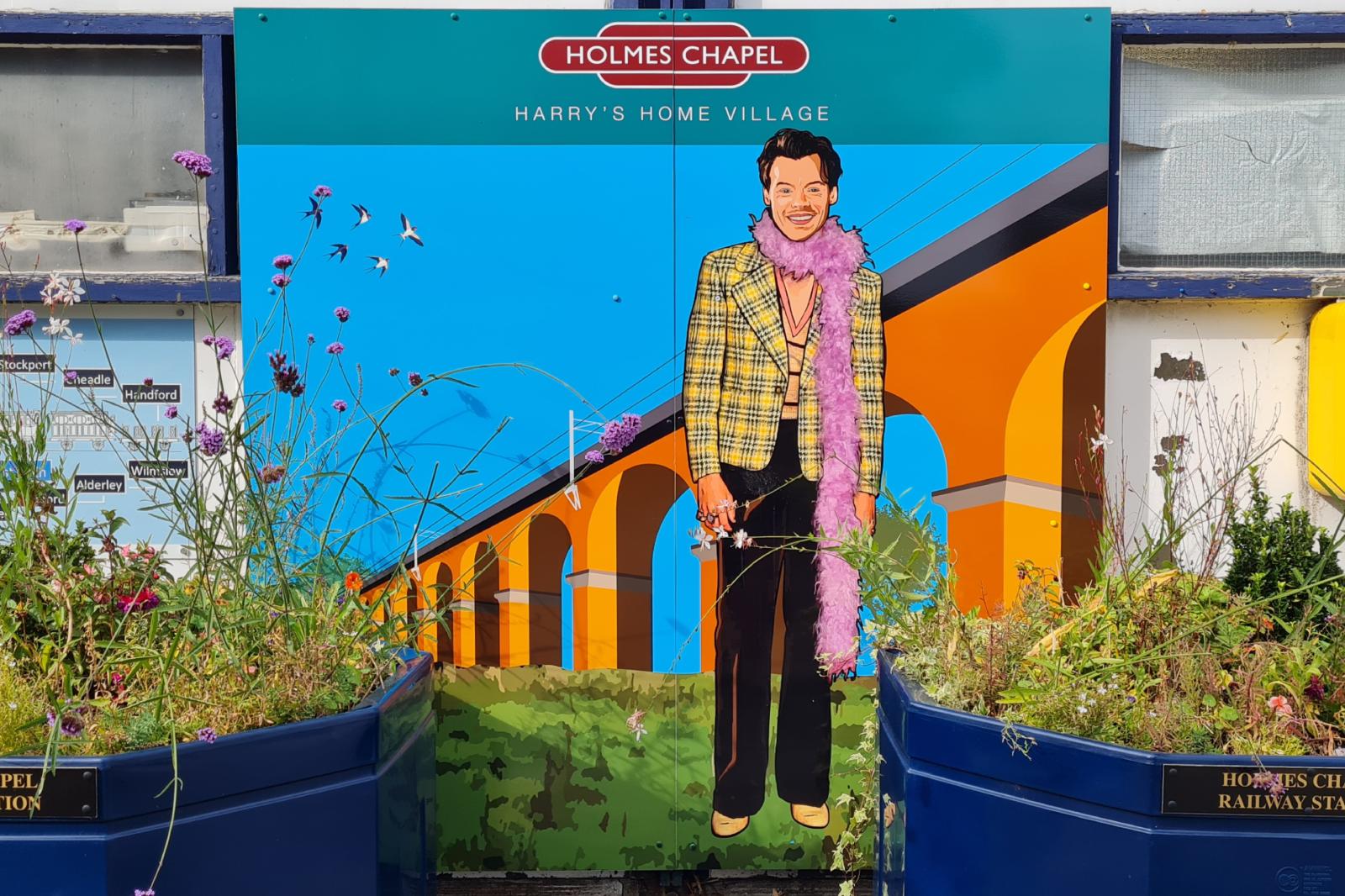 Mural of Harry Styles at Twemlow Viaduct at Holmes Chapel Railway Station, England