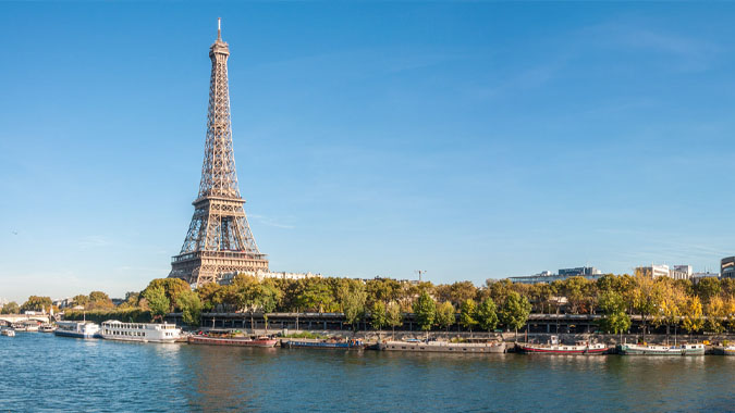 Eiffel Tower across the River Seine, Paris, France by SimonCourtecuisse https://commons.wikimedia.org/wiki/File:Panorama_de_la_Tour_Eiffel.jpg