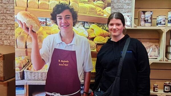 Sienna with a picture of Harry Styles in his hometown of Holmes Chapel
